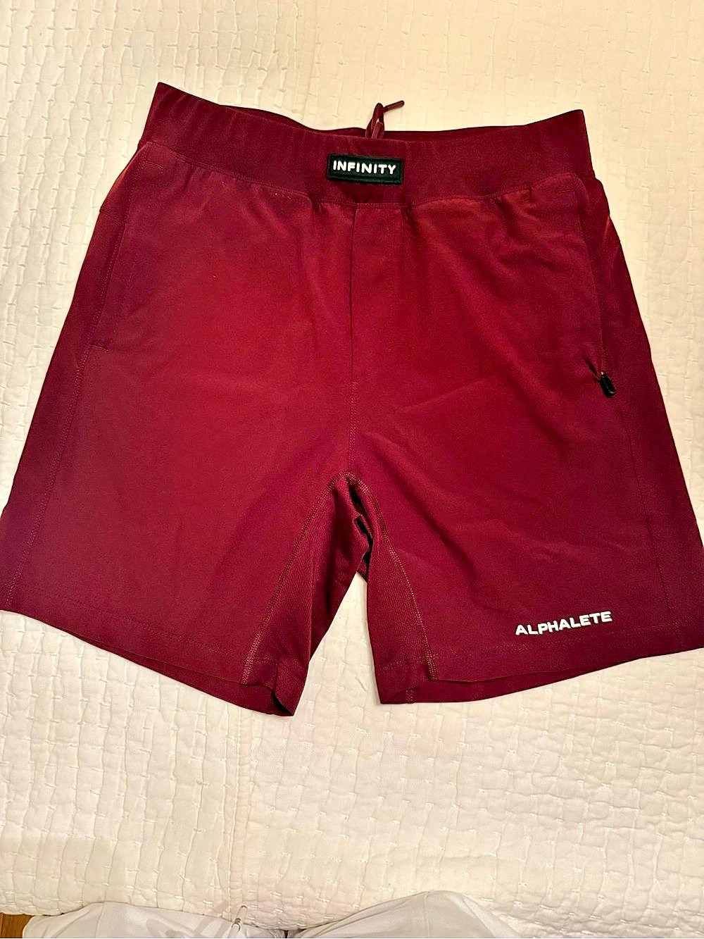 Alphalete Infinity 7” Short Athletic Shorts in Burgundy